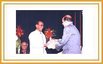 Shahir Sable being felicitated by Shri. Manohar Joshi