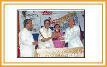 Shri. Upendra Bhat and Shri. Yashwant Deo felicitate Shri. Madhukar Kothare - a veteran Tabla artist