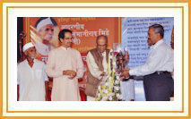 Shri. Ninad Bedekar being felicitated