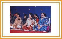 Shri. Pramod Ranade, Smt. Asha Khadilkar and Smt. Vedashree Oke presenting Babuji's composition